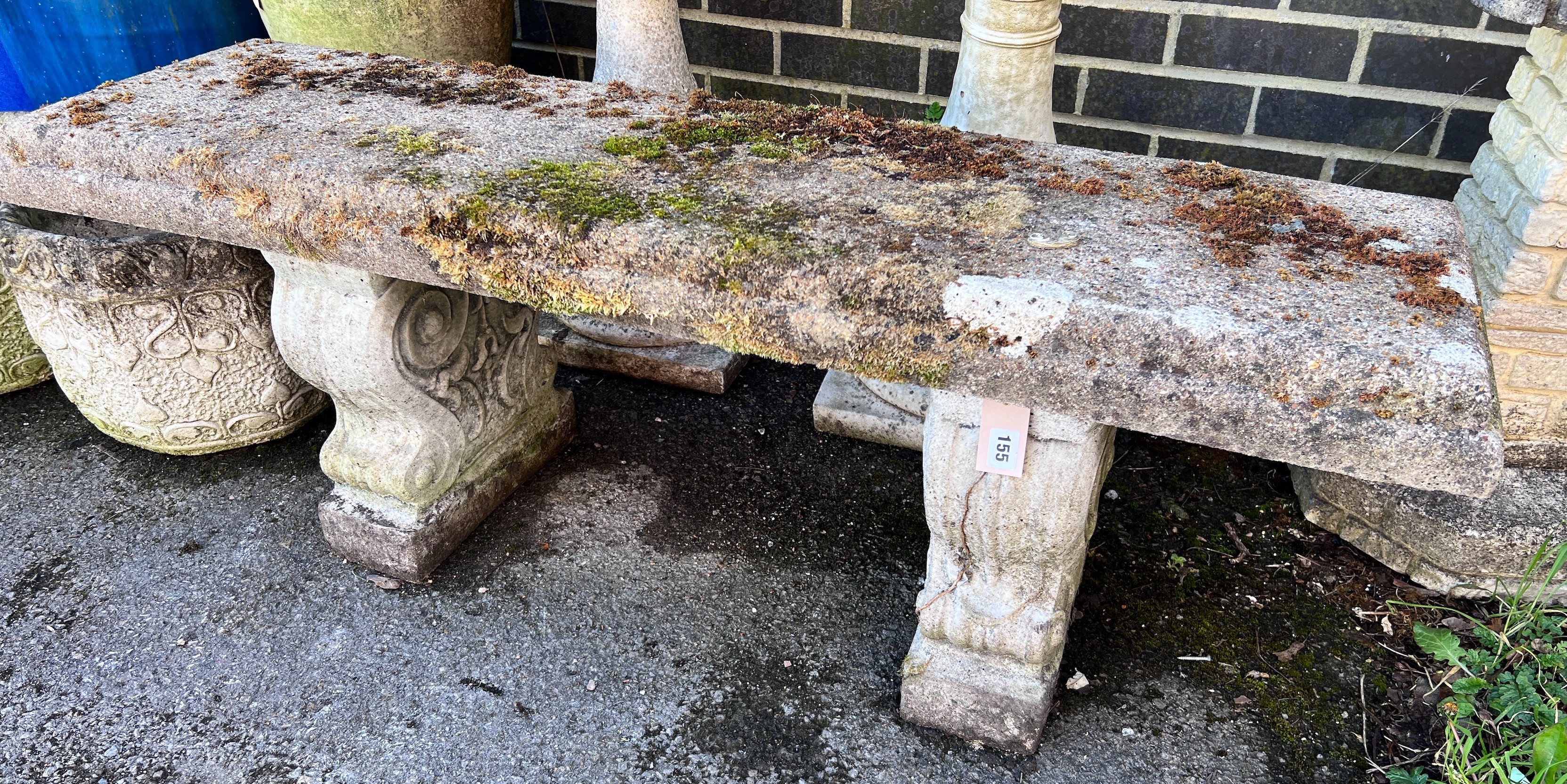 A reconstituted stone garden bench, length 128cm, depth 37cm, height 45cm *Please note the sale commences at 9am.